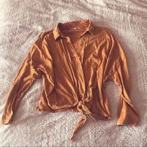 Apricot colored collared long sleeve tie cropped